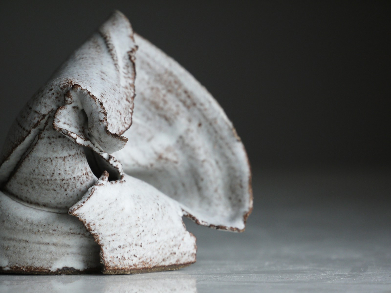 white and brown stone fragment